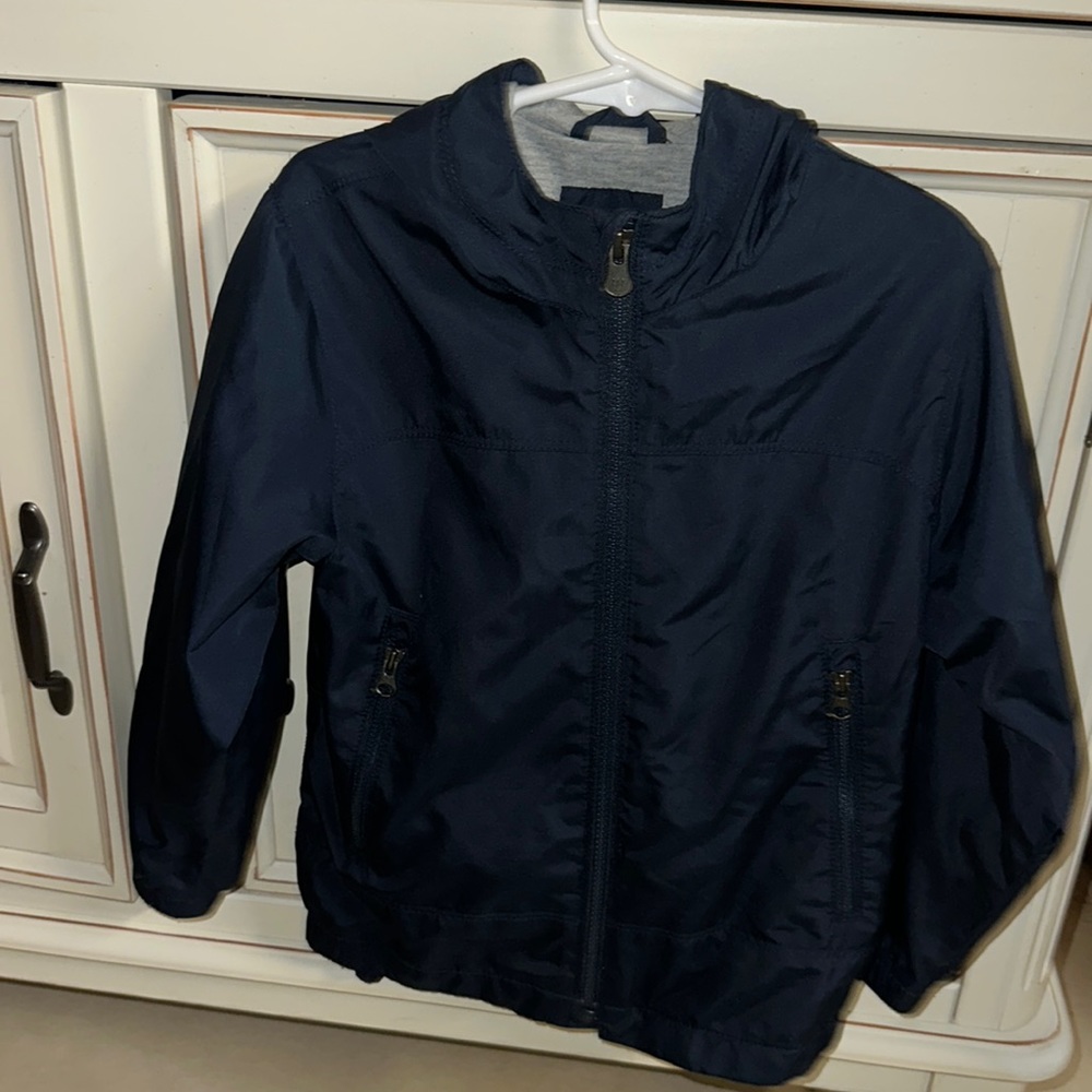 Navy blue windbreaker